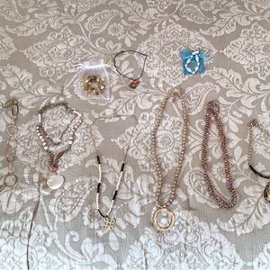 Bundle of 9 jewelry. 7 necklaces and 2 bracelets